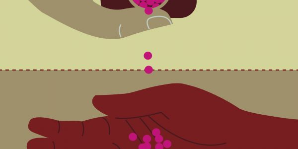 Person pouring pills into hand